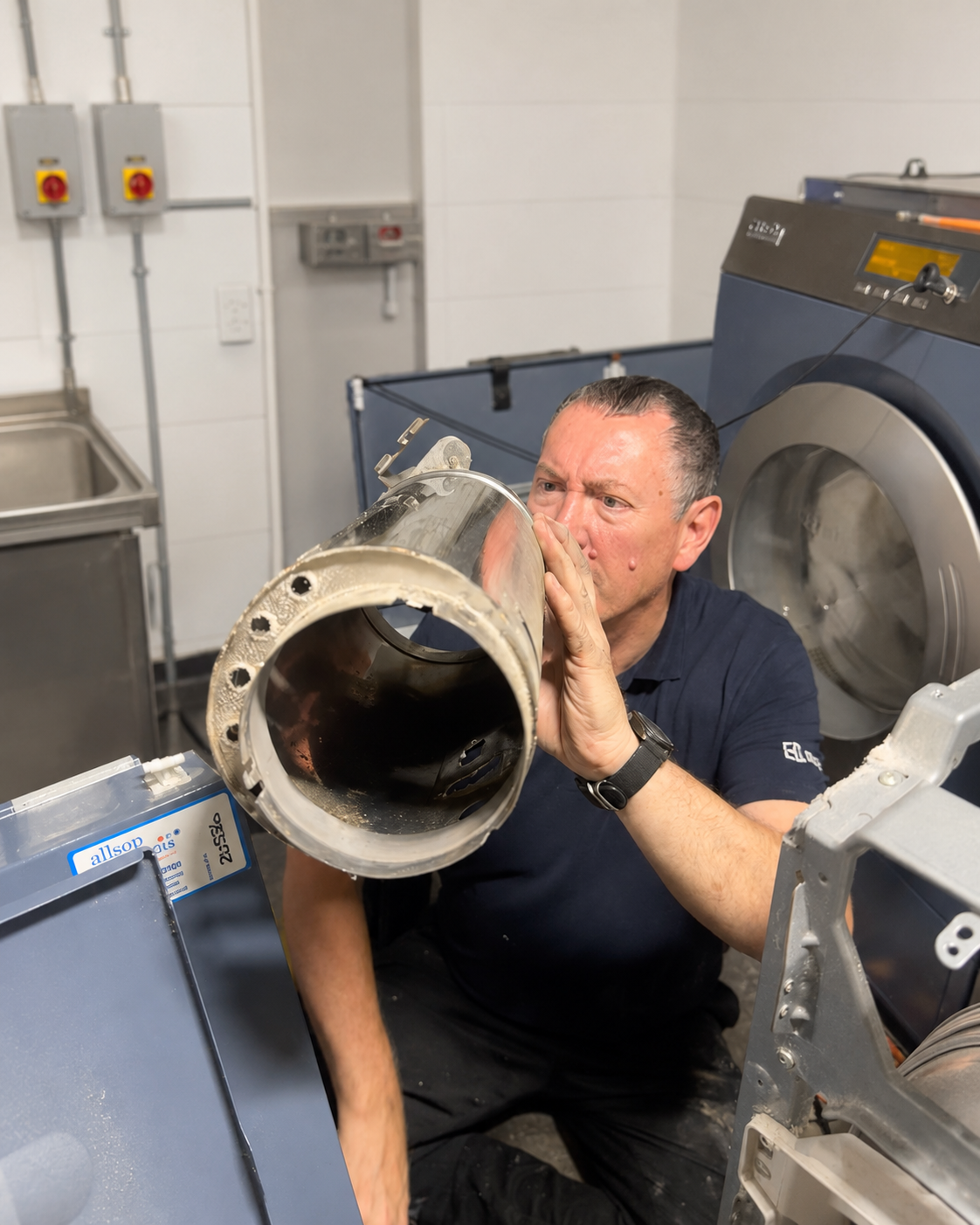 a&f engineer carrying out professional laundry equipment servicing